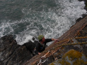 Dave nearing the top of the upper slab on Sluice